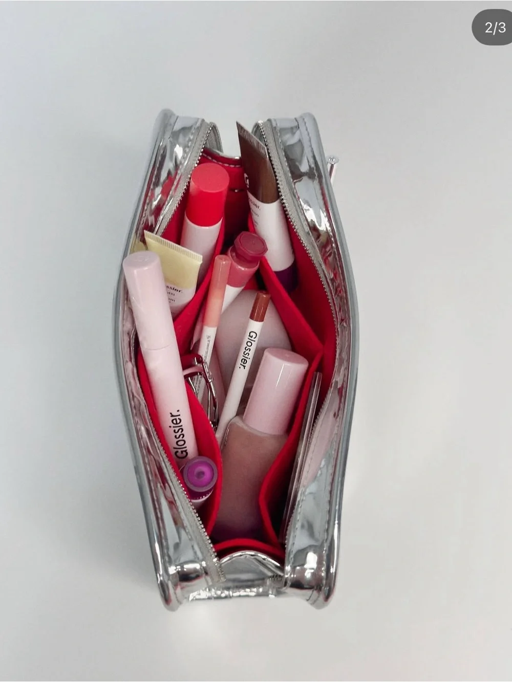 Limited Glossier Chrome make-up bag